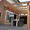 Muuraanbouw veranda DD50G Deluxe - glas dak